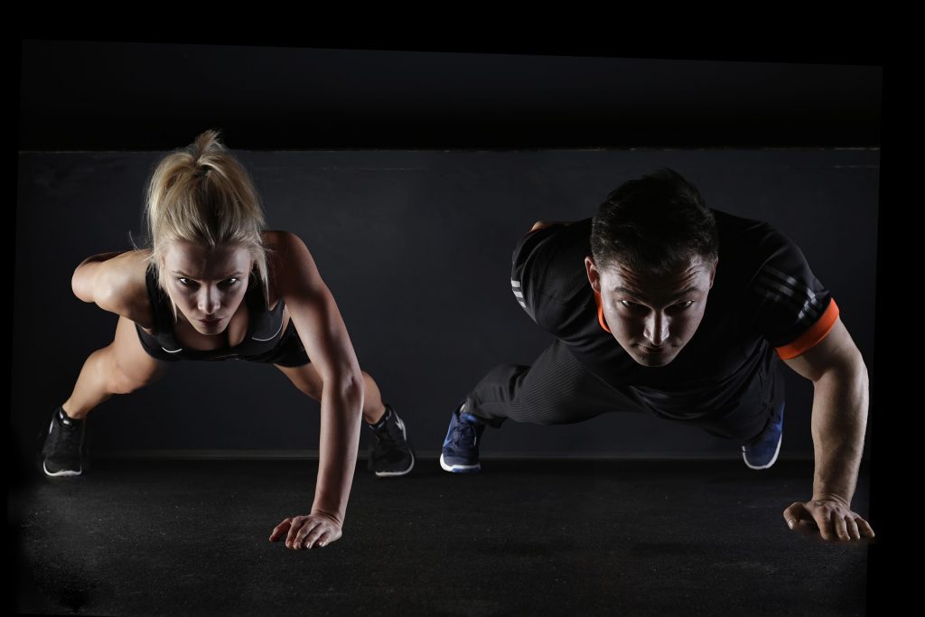 trainer with girl push ups