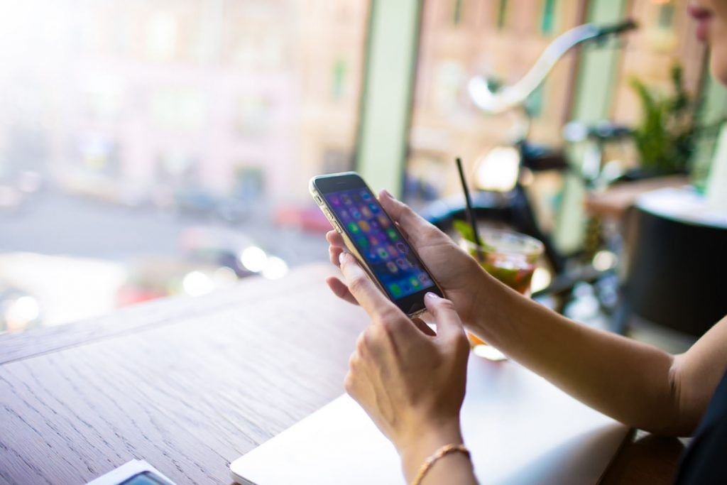 Using the phone in a cafe